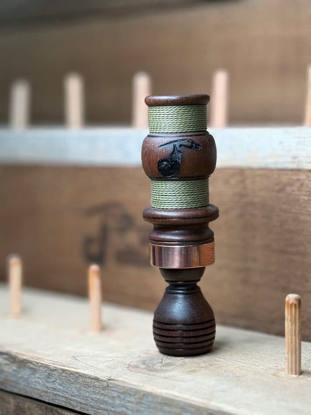 Walnut single reed w/ green cord wrap