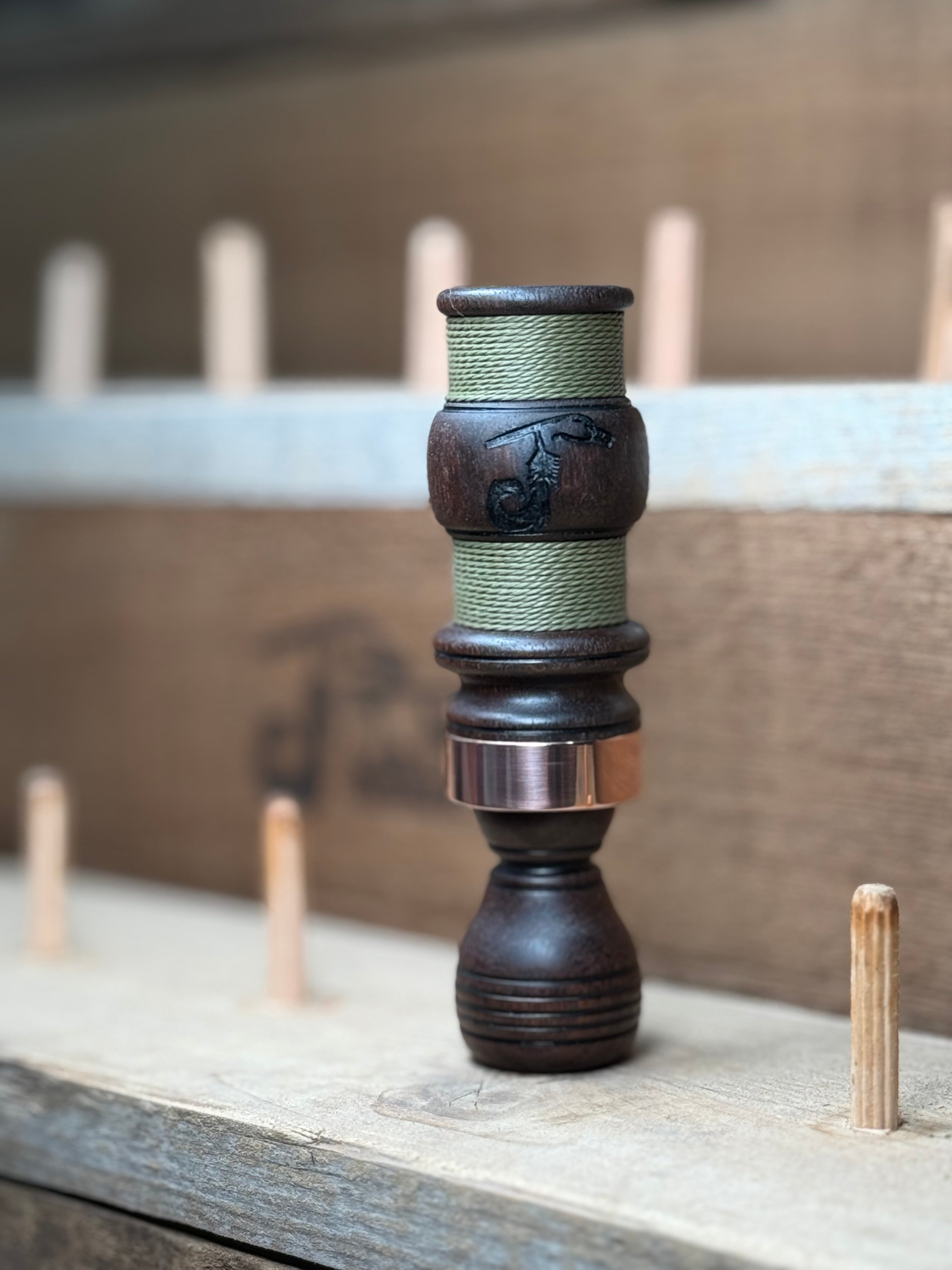 Walnut single reed w/ green cord wrap
